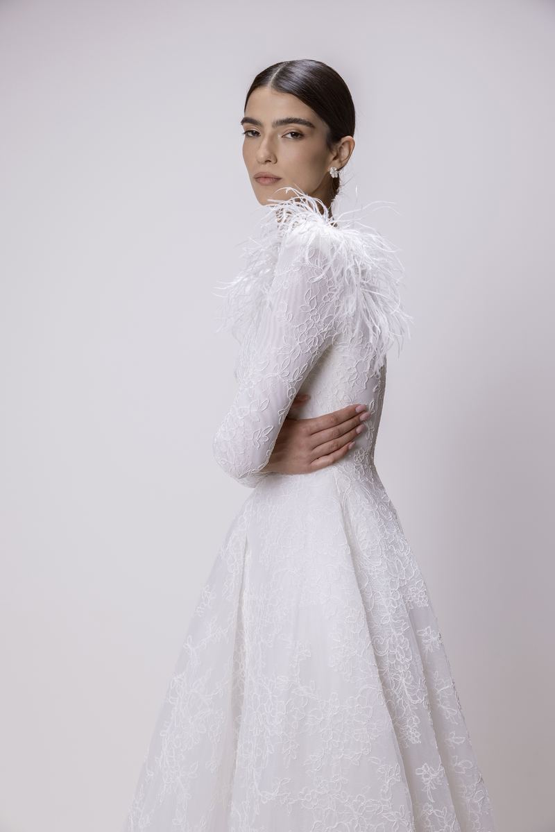 Feather Embrace — feather collar detail in profile